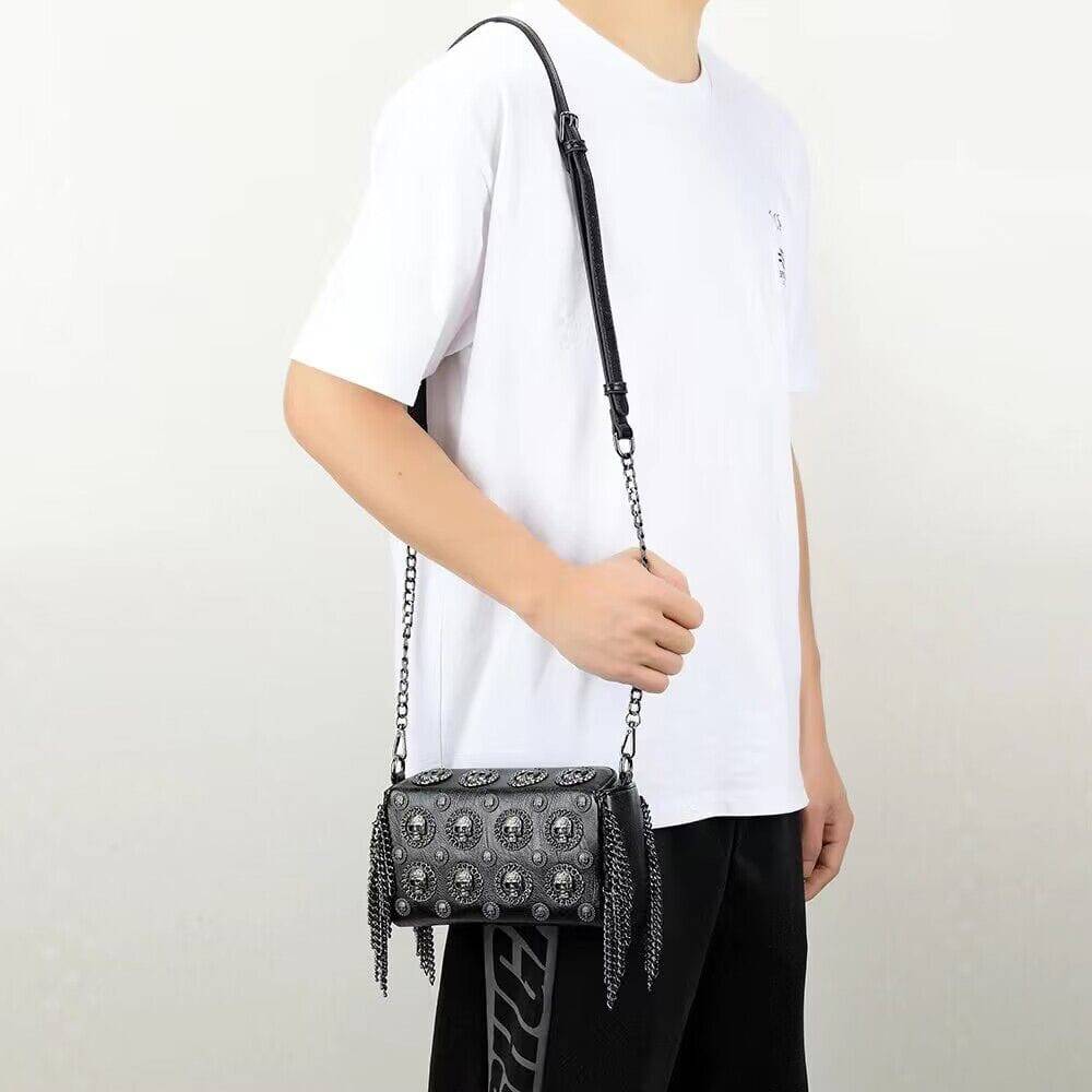 Rossie Viren 3D skull shoulder bag with studded chain straps, stylish accessory with edgy design and textured details.