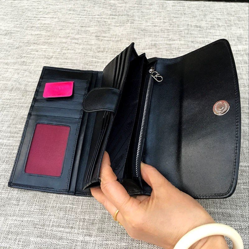 Genuine stingray TriFold wallet with floral design for women by Rossie Viren, showing the textured stingray leather and floral accents.