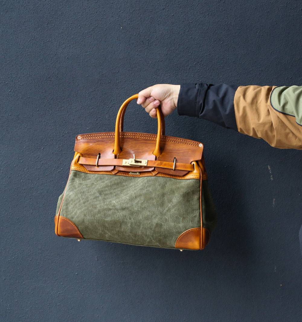 Unisex vintage oil wax leather top handle canvas bag by Rossie Viren, featuring large size and classic design with sturdy handle.