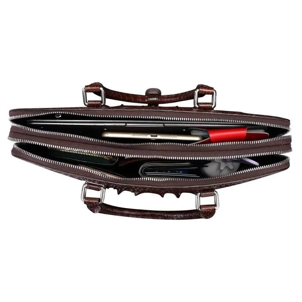 Brown crocodile leather large volume briefcase by Rossie Viren, featuring sturdy handles and spacious interior for professional use.