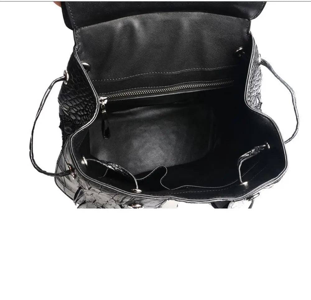 Rossie Viren crocodile leather city backpack handbag with sleek design and textured crocodile pattern, front zip pocket, and adjustable straps.