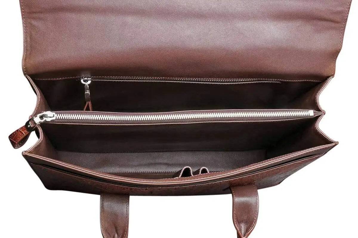 Rossie Viren crocodile leather foldover briefcase handbag with sleek design and sturdy handle, showcasing luxurious texture.