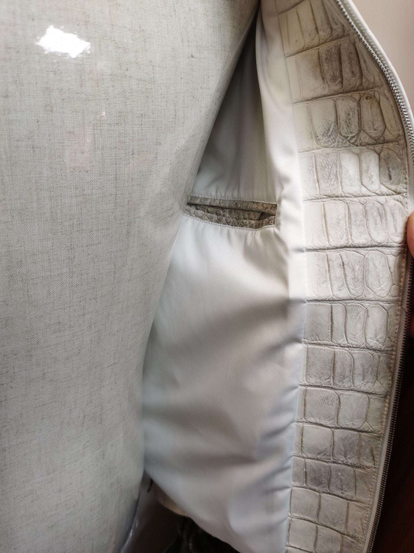 Himalaya white crocodile leather zip-up jacket by Rossie Viren, featuring a sleek design and textured crocodile pattern.