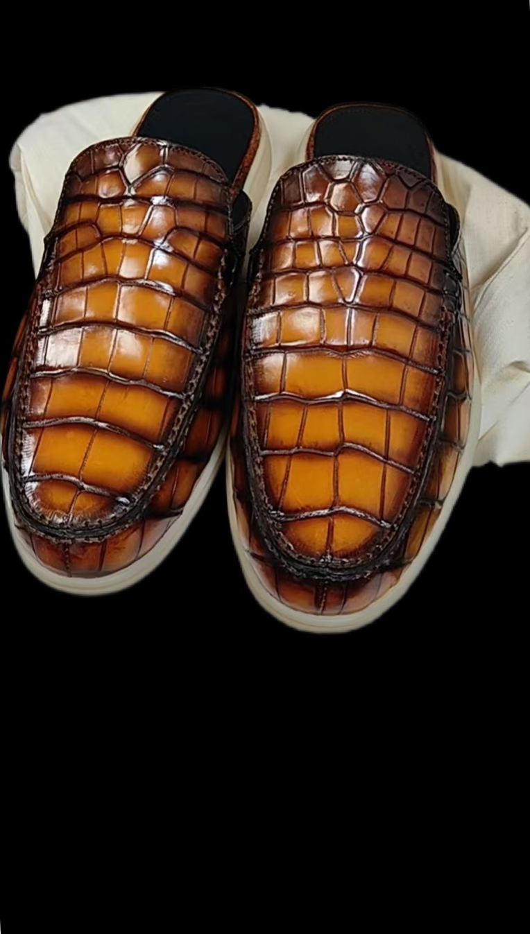 Rossie Viren crocodile leather loafer shoes featuring a sleek design and detailed crocodile skin texture.