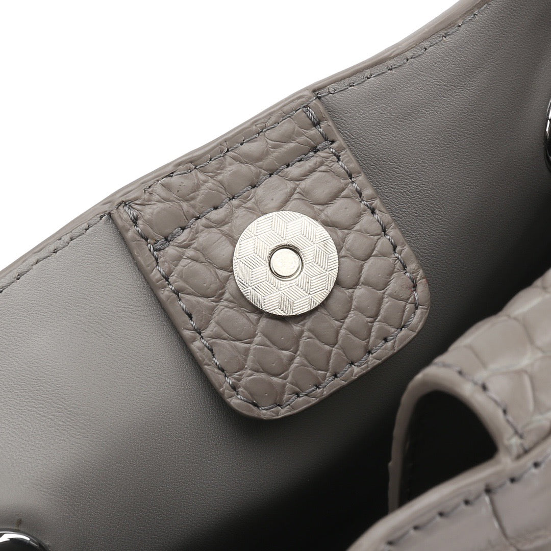Unisex crocodile leather drawstring bucket shoulder bag with crossbody straps, large capacity, by Rossie Viren.