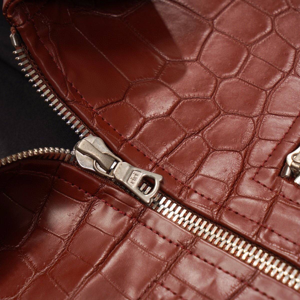 Red crocodile leather jacket by Rossie Viren featuring a zip-up slim fit casual trucker coat with detailed leather texture.