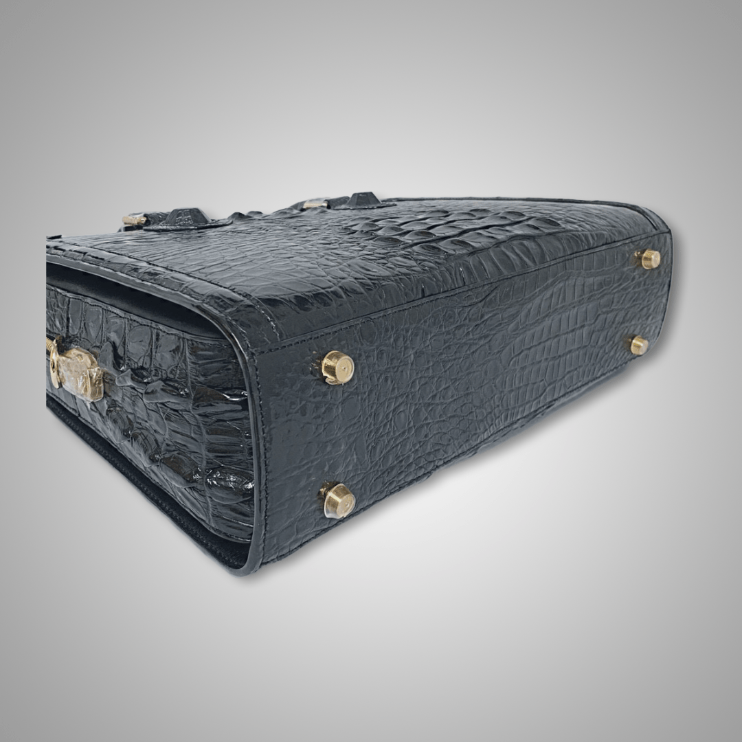 Rossie Viren crocodile skin leather briefcase with bone accents, featuring a sleek, professional design for business use.