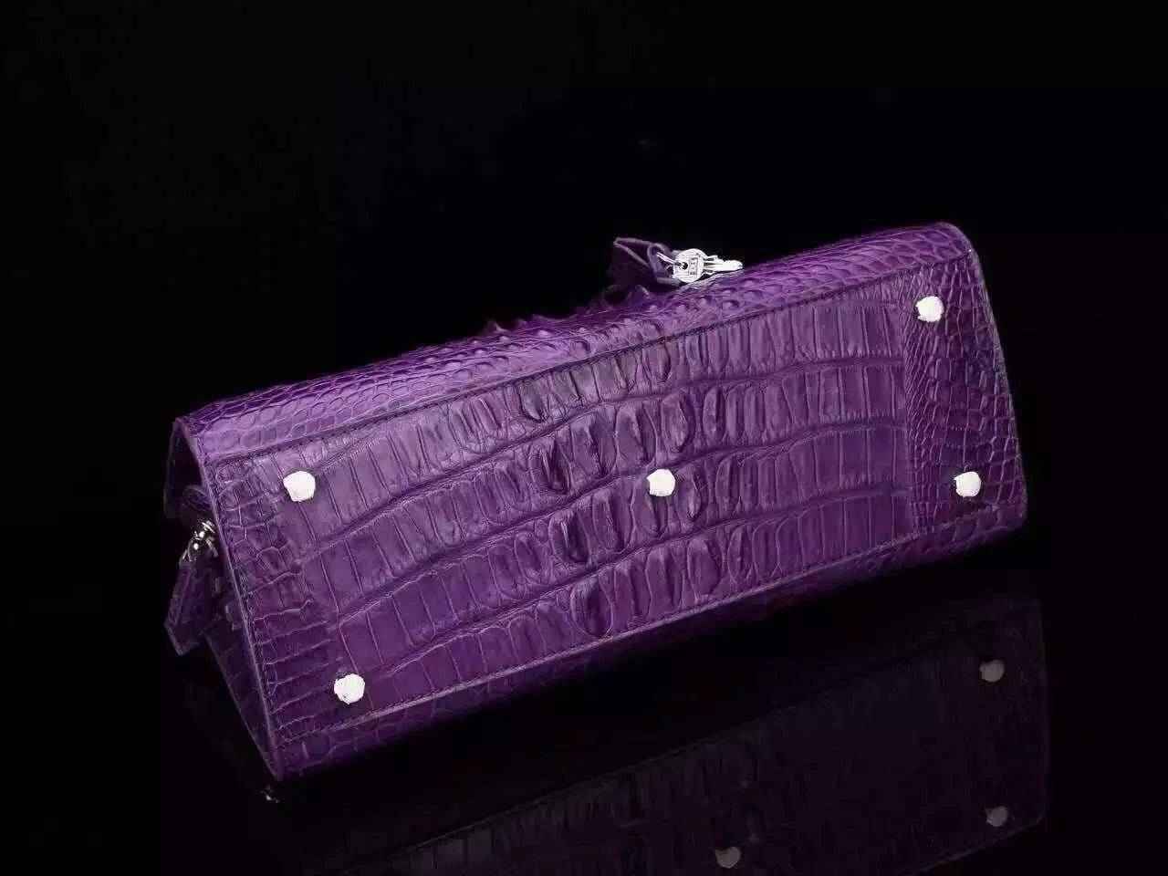 Women's genuine crocodile leather tote handbag with padlock detail from Rossie Viren, featuring a structured design and top handles.