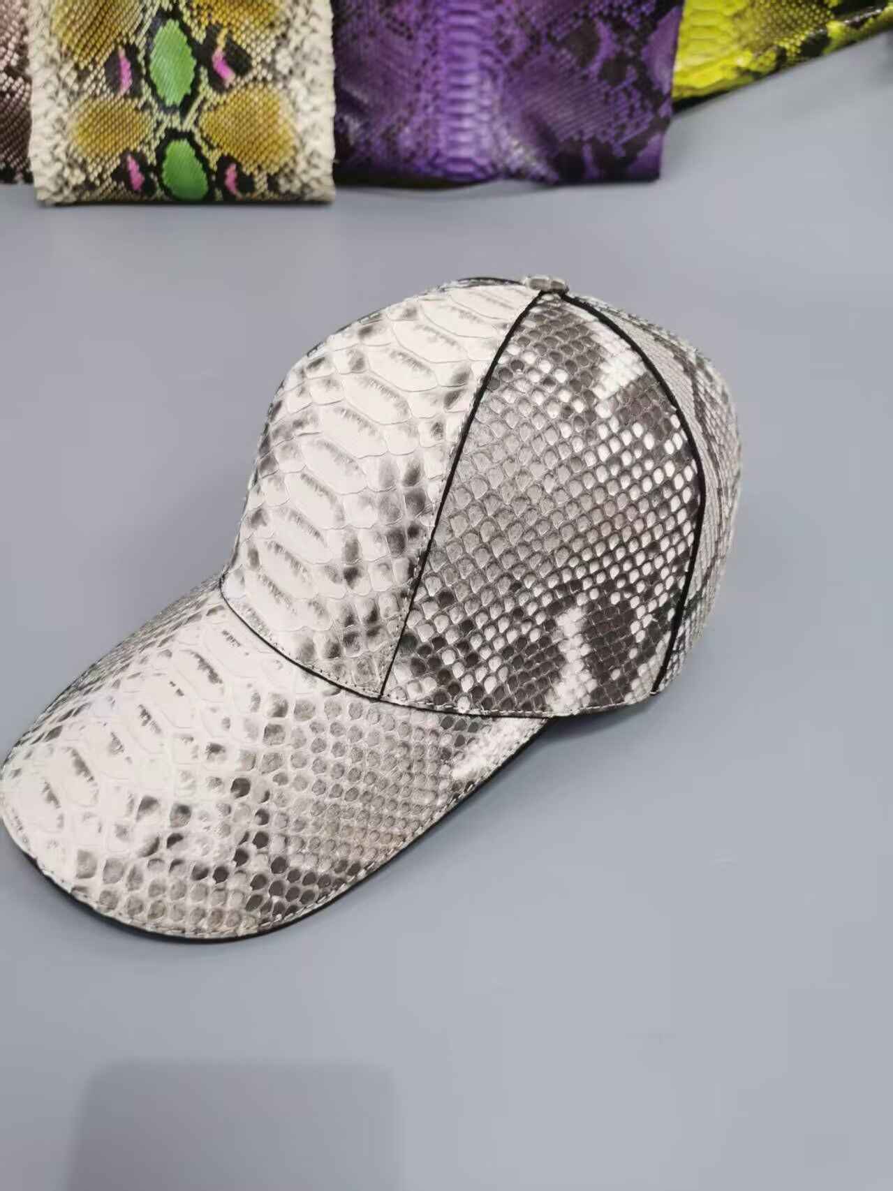 Rossie Viren Python baseball cap, black cap with embroidered Python logo, adjustable strap and curved brim.