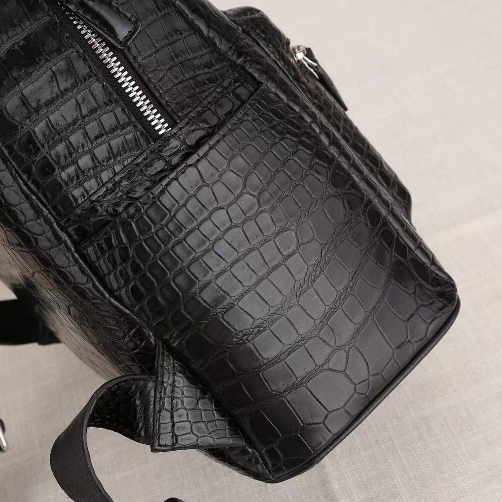 Crocodile leather women's backpack by Rossie Viren featuring a textured crocodile pattern and sleek design.