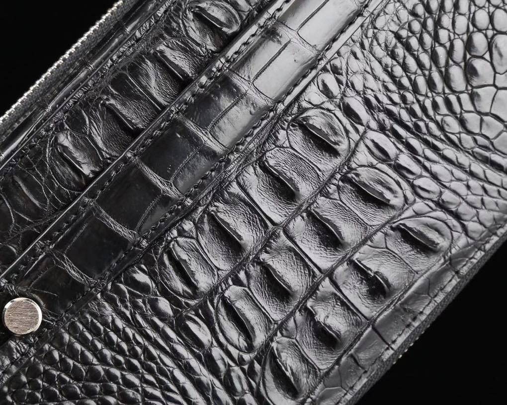 Rossie Viren crocodile leather clutch wallet with multiple compartments and large capacity for credit cards and cash.
