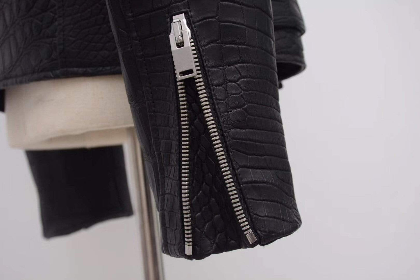 Black crocodile leather motorcycle jacket by Rossie Viren, slim fit racer style for men and women, featuring sleek, textured leather design.