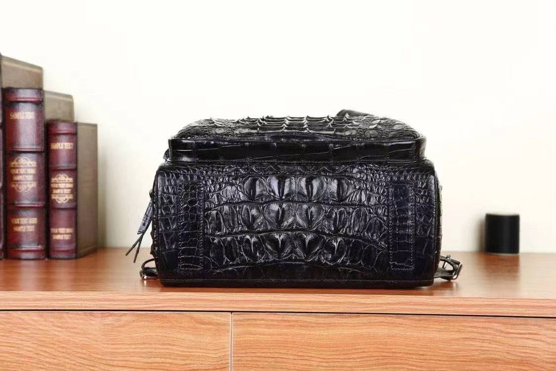 Black genuine crocodile skin leather briefcase by Rossie Viren, featuring a sleek design suitable for business travel and professional use.