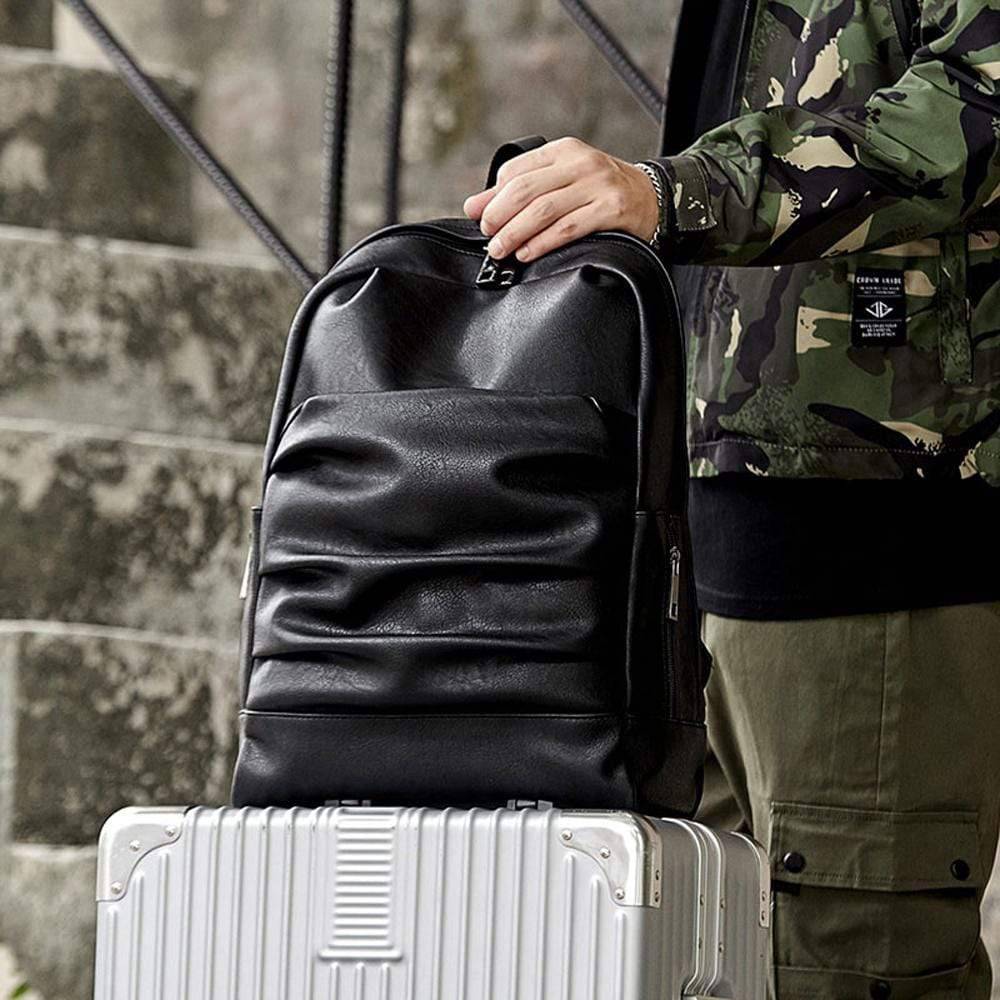 Rossie Viren large waterproof laptop backpack with pleated front zipper pocket and wheels for easy travel and storage.