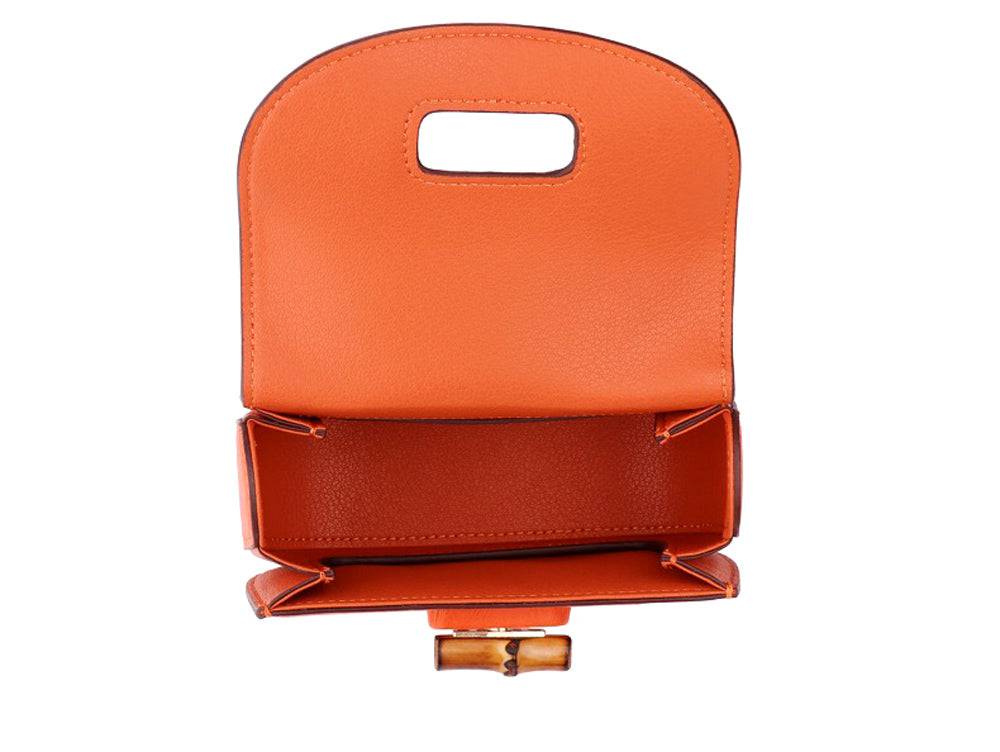 Rossie Viren ostrich leather nano bamboo top handle crossbody bag with a sleek design and compact silhouette.