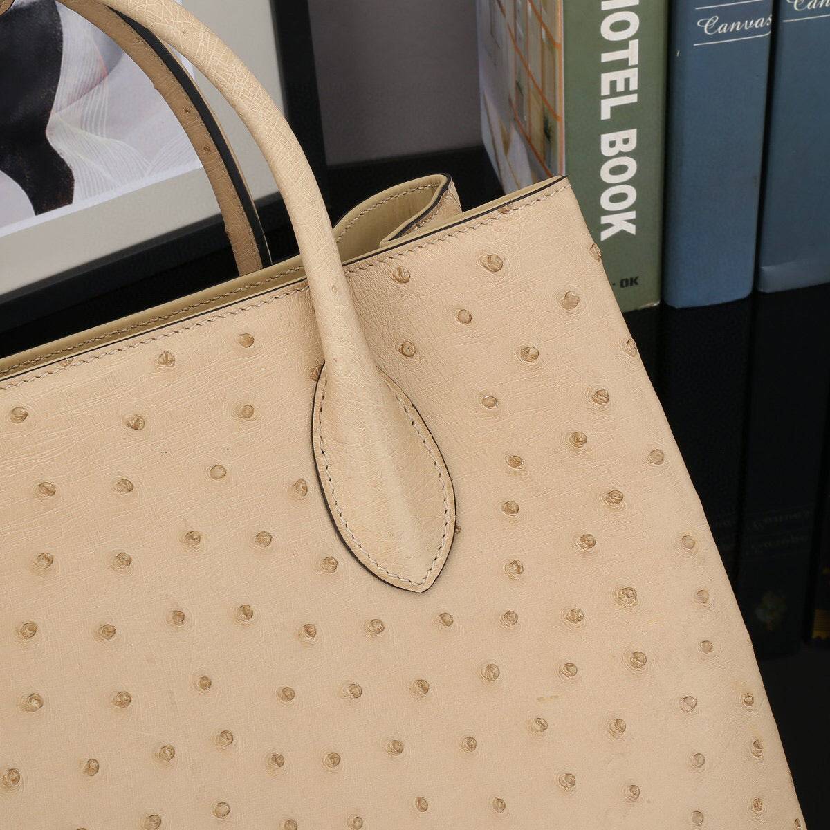 Rossie Viren ostrich leather handbag with top handle and shoulder strap, 32cm size, stylish and luxurious accessory.