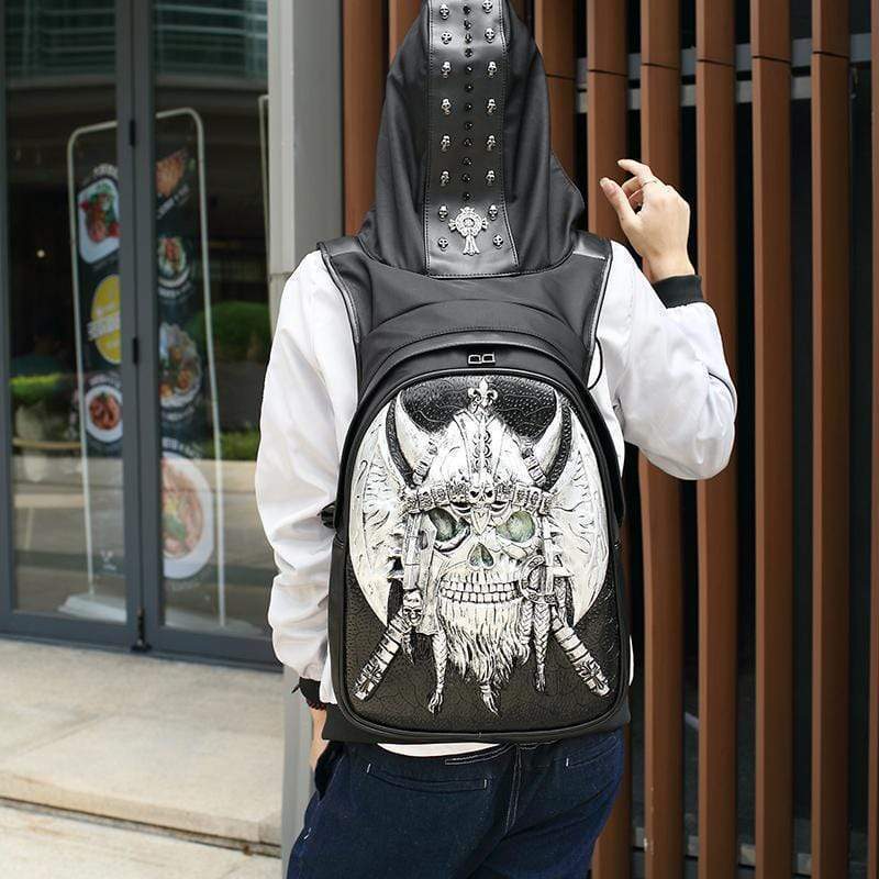 Rossie Viren 3D ghost skull backpack with glow-in-the-dark design, large capacity, rivets, and matching hat for teens and travelers.