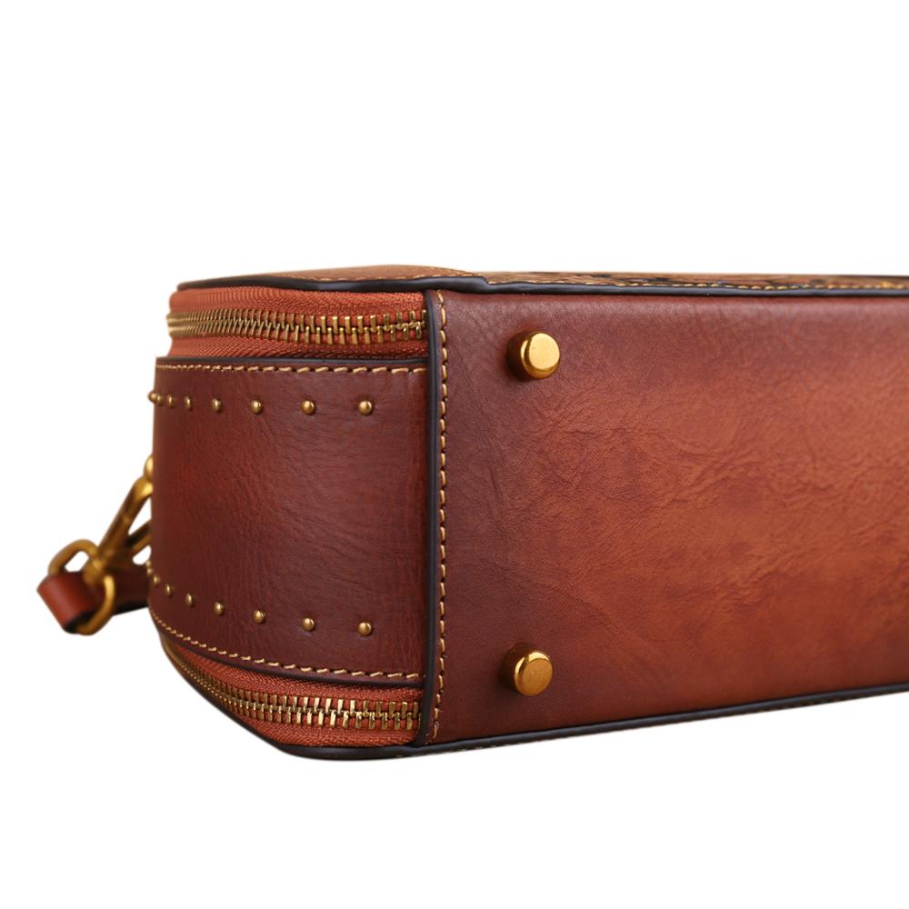 Rossie Viren women's vintage studded mini half-moon top handle crossbody shoulder bag with gold-tone hardware and adjustable strap.