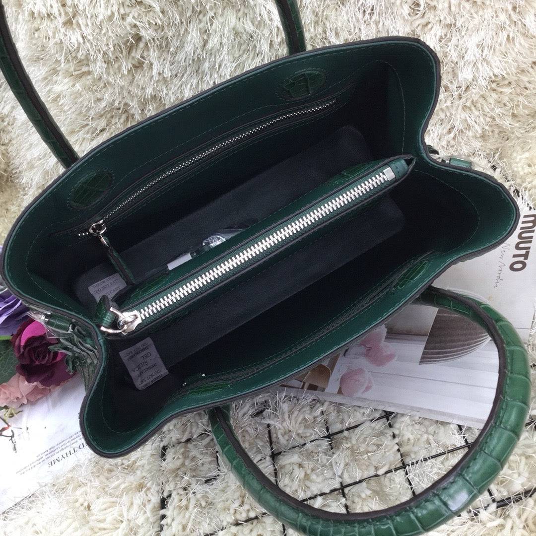Dark green women's crocodile skin leather satchel bag, 30cm handbag by Rossie Viren with textured crocodile pattern.