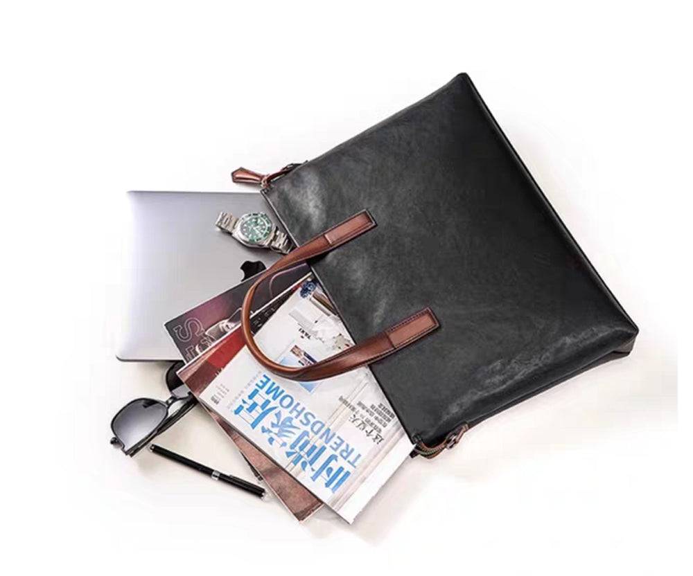 Black Rossie Viren 15-inch Togo leather laptop briefcase handbag with sturdy handle and sleek design.