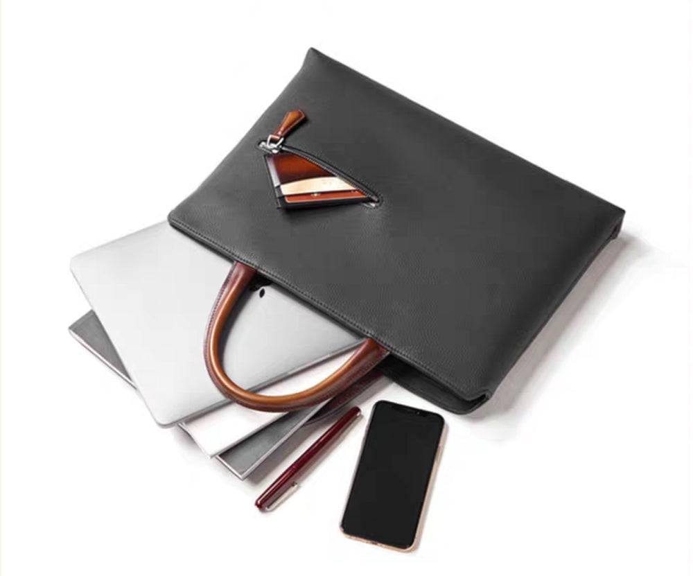 Black 14-inch imported grainy leather laptop briefcase bag by Rossie Viren, featuring a classic handbag design.