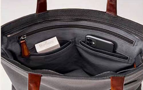 Black 14-inch imported grainy leather laptop briefcase bag by Rossie Viren, featuring a classic handbag design with sturdy handles.
