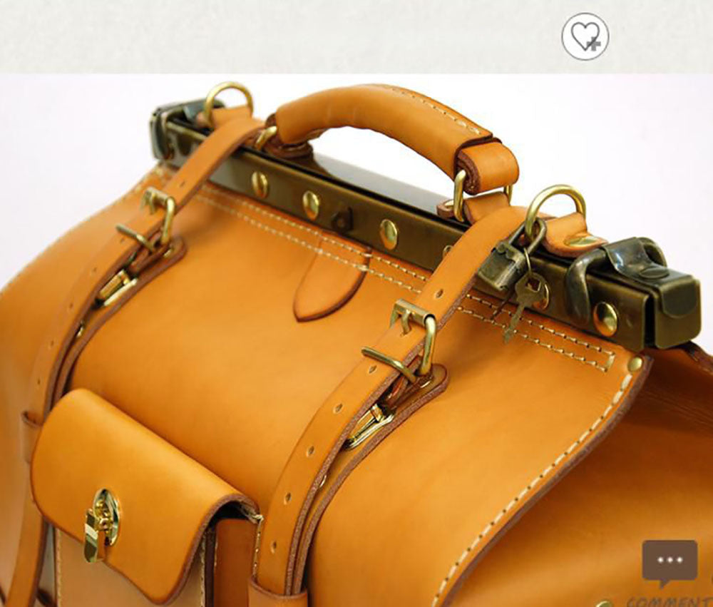 Rossie Viren crocodile leather large top handle satchel handbag with sturdy handles and sleek design.