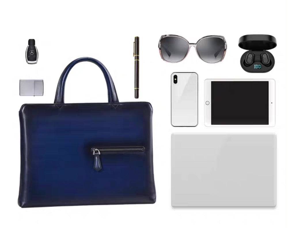 15-inch vintage leather laptop briefcase handbag by Rossie Viren, featuring a classic design with sturdy handles and a sleek finish.