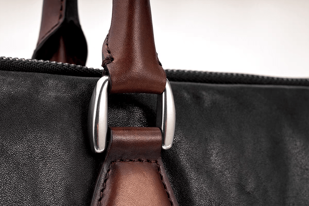 Black 15-inch Rossie Viren calfskin leather laptop briefcase bag with a classic, professional handbag design.