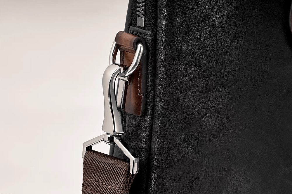 Rossie Viren 15-inch black calfskin leather laptop briefcase bag with sleek, classic design and sturdy handles.