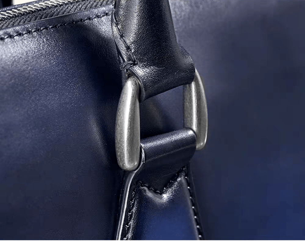 Vintage leather laptop briefcase bag from Rossie Viren, 14-inch imported handbag with classic design and sturdy handles.