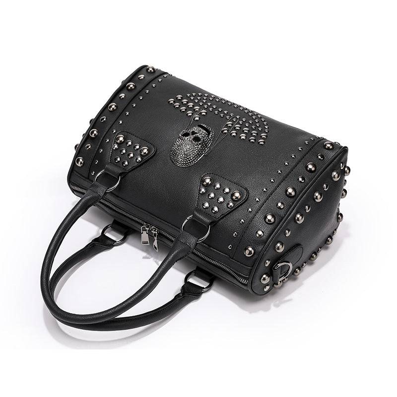 Rossie Viren 3D Crystal Skull shoulder bag with studded satchel design, featuring a detailed crystal skull embellishment and textured surface.