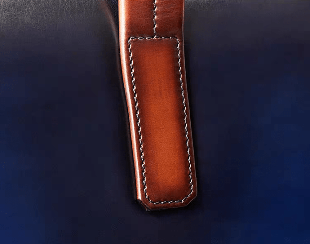 Rossie Viren 15-inch vintage leather laptop briefcase bag with handle, front pocket, and classic design.