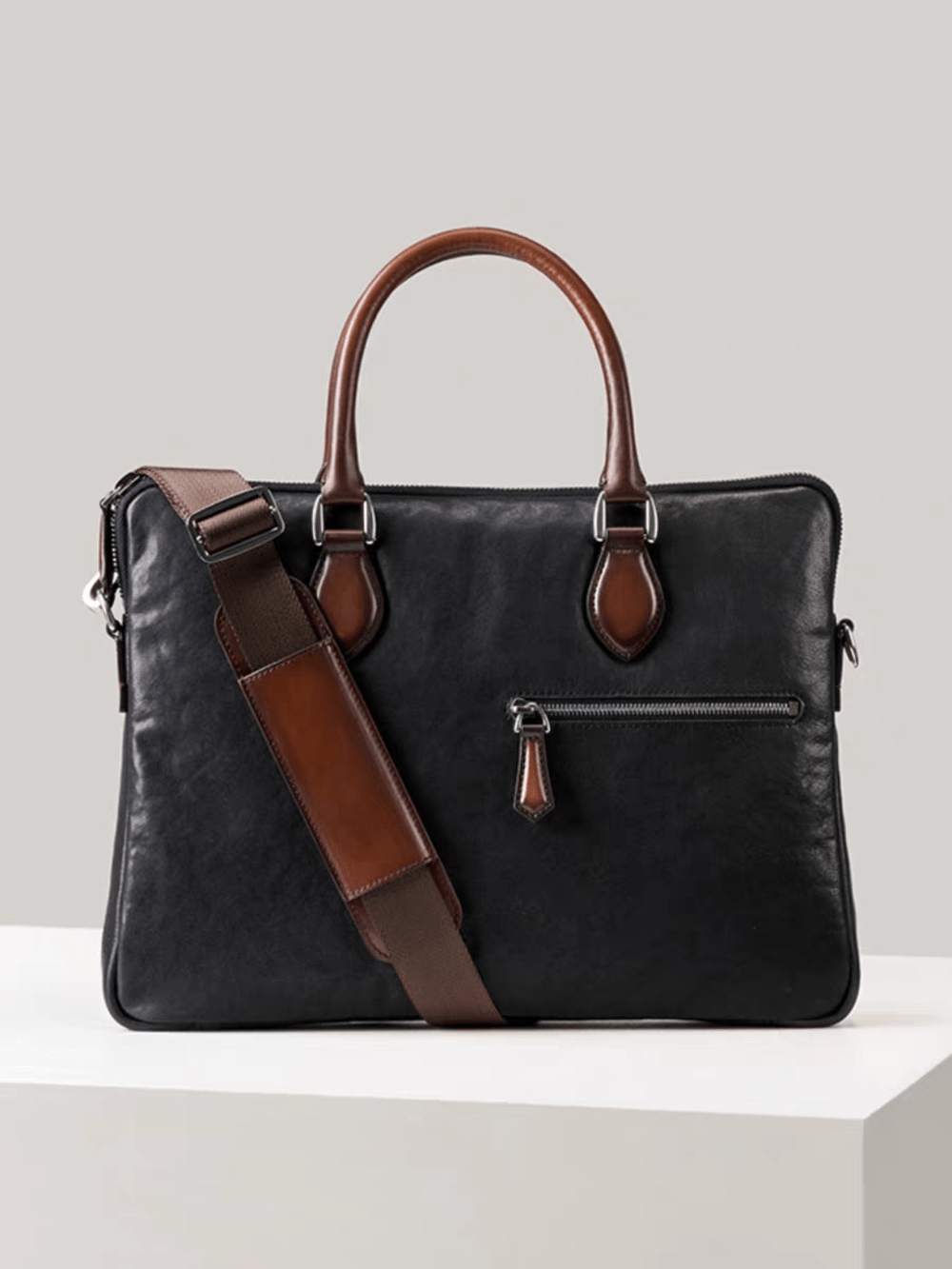 Rossie Viren 15-inch imported calfskin leather laptop briefcase in classic black, with sturdy handles and sleek design.