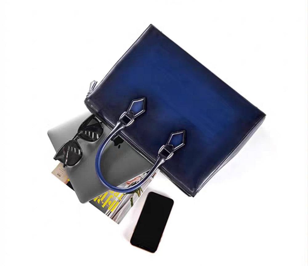 14-inch imported vintage leather laptop briefcase bag by Rossie Viren, featuring a classic handbag design with sturdy handles.