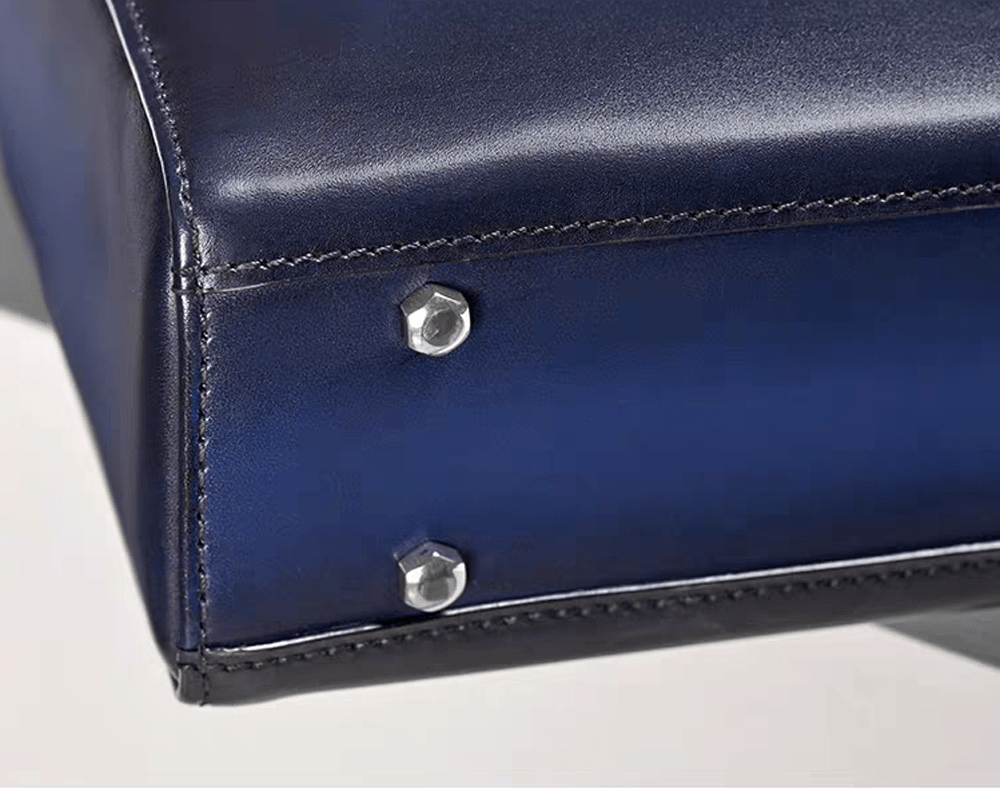 Vintage leather 14-inch Rossie Viren laptop briefcase bag with sturdy handles and classic design, perfect for professional use.