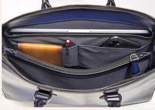 Vintage leather laptop briefcase bag by Rossie Viren, 14-inch imported handbag with sturdy handles and classic design.