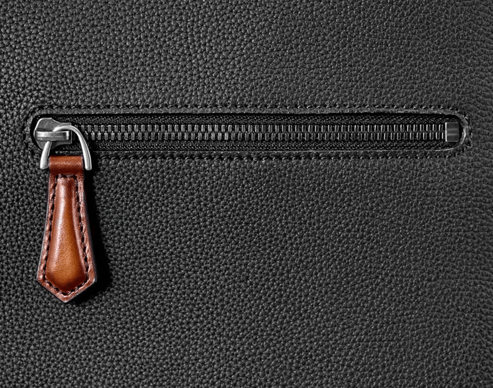 Black 14-inch imported grainy leather laptop briefcase handbag by Rossie Viren, showcasing sturdy handle and classic design.