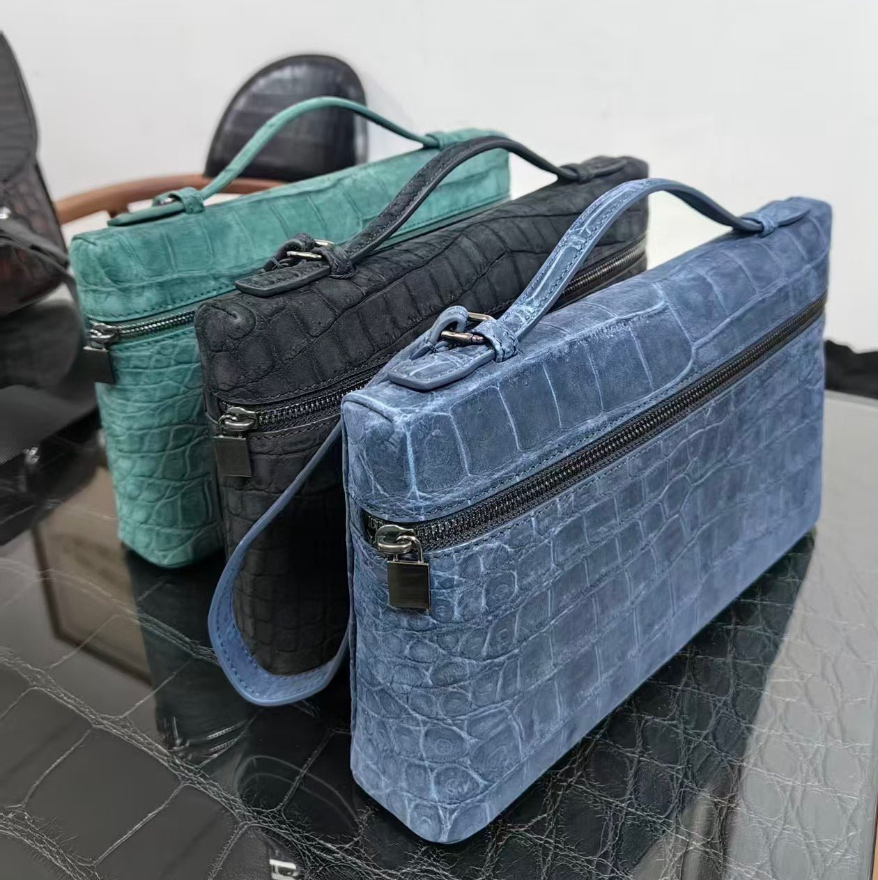 Unisex Rossie Viren crocodile skin leather clutch bag with zipper handle, made from nubuck genuine crocodile leather.