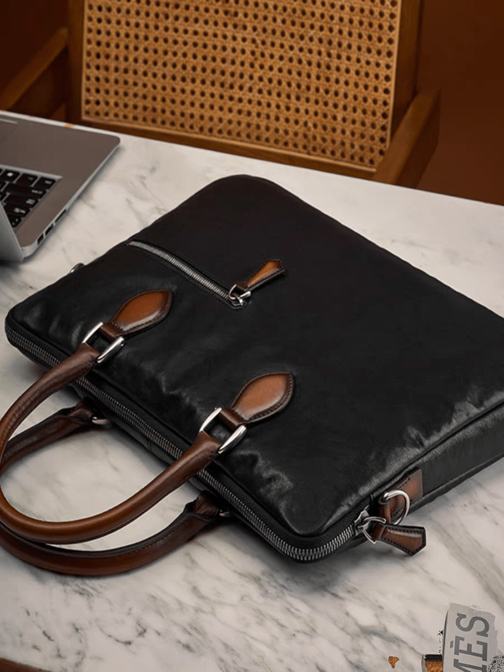 15-inch black Rossie Viren calfskin leather laptop briefcase bag, classic handbag design with sleek, smooth leather exterior.