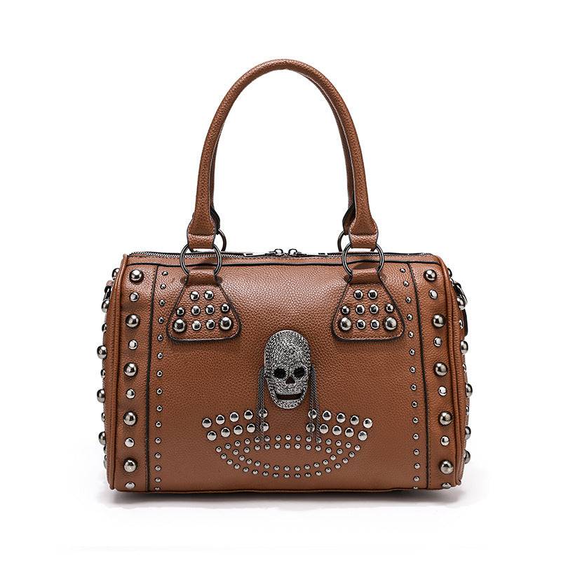 Rossie Viren 3D Crystal Skull shoulder bag with studded satchel details, featuring a unique, decorative design with sparkling crystal accents.