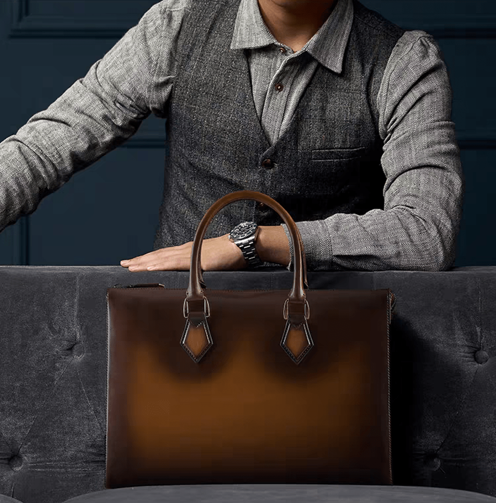 Vintage 14-inch leather laptop briefcase handbag by Rossie Viren, featuring classic design and durable imported leather.