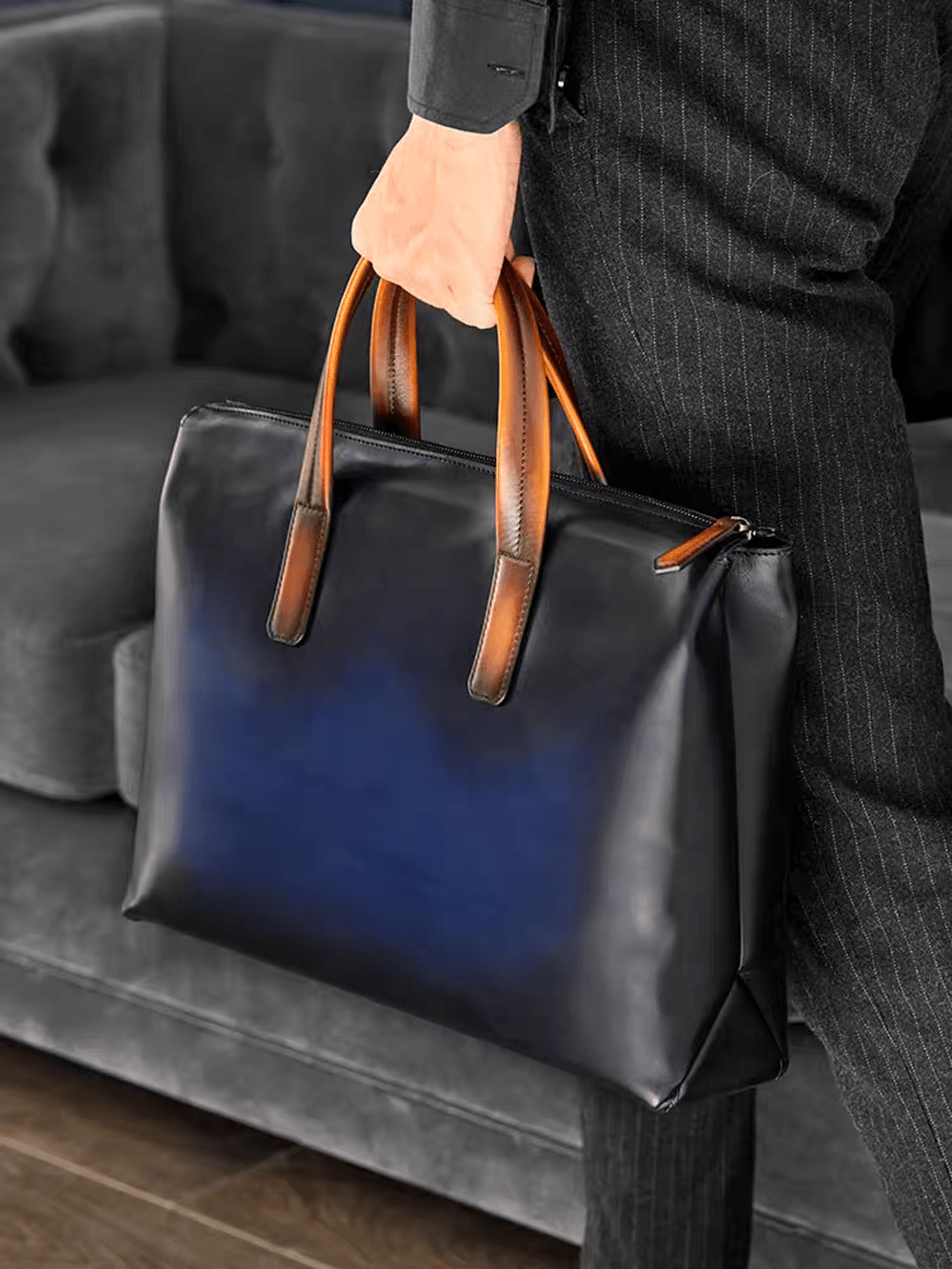 Vintage 15-inch leather laptop briefcase handbag by Rossie Viren, featuring a classic design and sturdy leather construction.