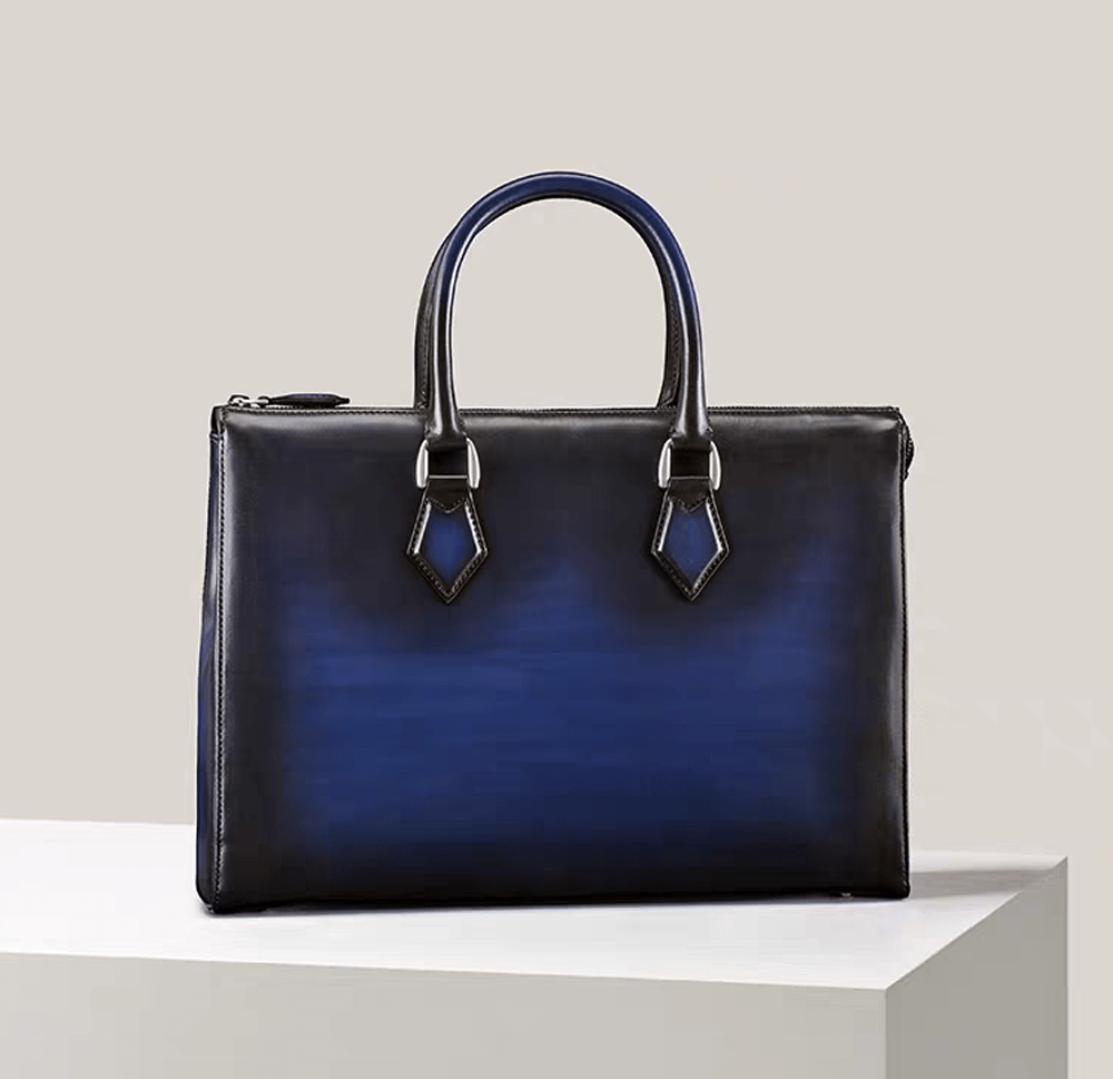 Vintage leather laptop briefcase handbag by Rossie Viren, 14-inch imported leather briefcase with classic design and sturdy handle.