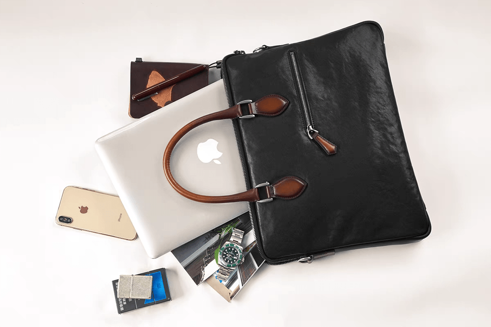 Black 15-inch imported calfskin leather Rossie Viren laptop briefcase bag with classic design and sturdy handles.