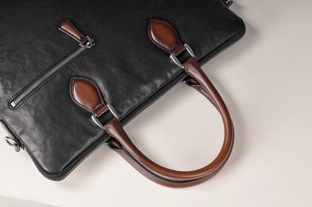 Black 15-inch Rossie Viren imported calfskin leather laptop briefcase handbag with sleek, professional design.