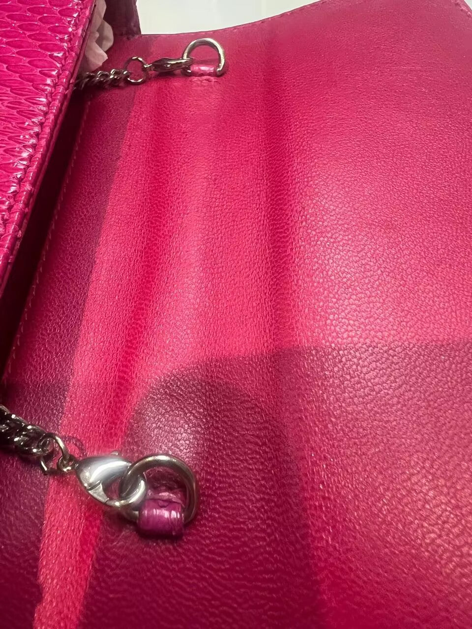 Hot pink Rossie Viren crocodile skin leather mini flap chain handbag with top handle and crossbody strap.