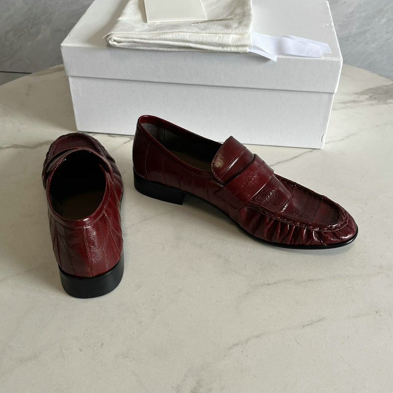 Eel skin women's loafers by Rossie Viren, stylish shoes with sleek eel leather finish and comfortable slip-on design.