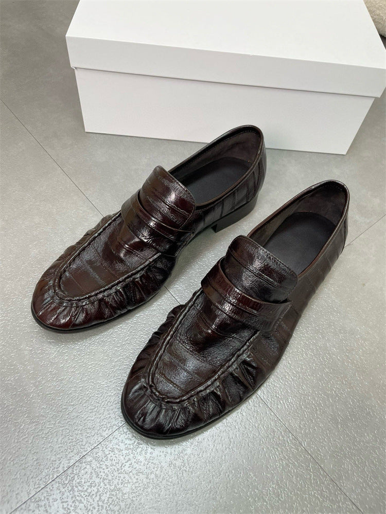 Rossie Viren eel skin loafers for women, stylish slip-on shoes with textured eel leather finish and classic design.