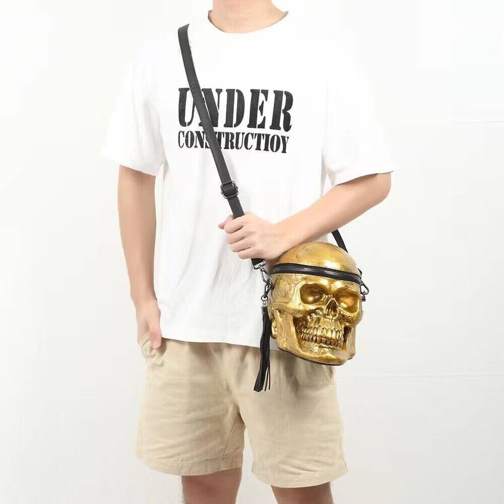 Rossie Viren 3D gold skull handle bag with crossbody strap and mini handle, featuring a stylish design and compact shape.